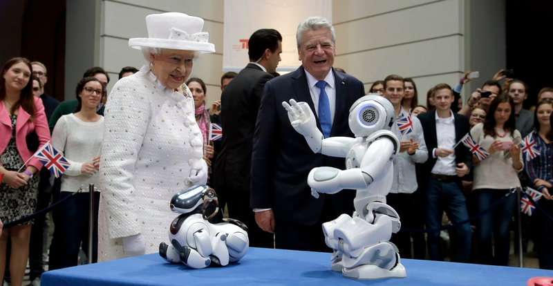 Illustration for article titled Queen Elizabeth Meets the Future Queen Who Is A Robot And Not A Human